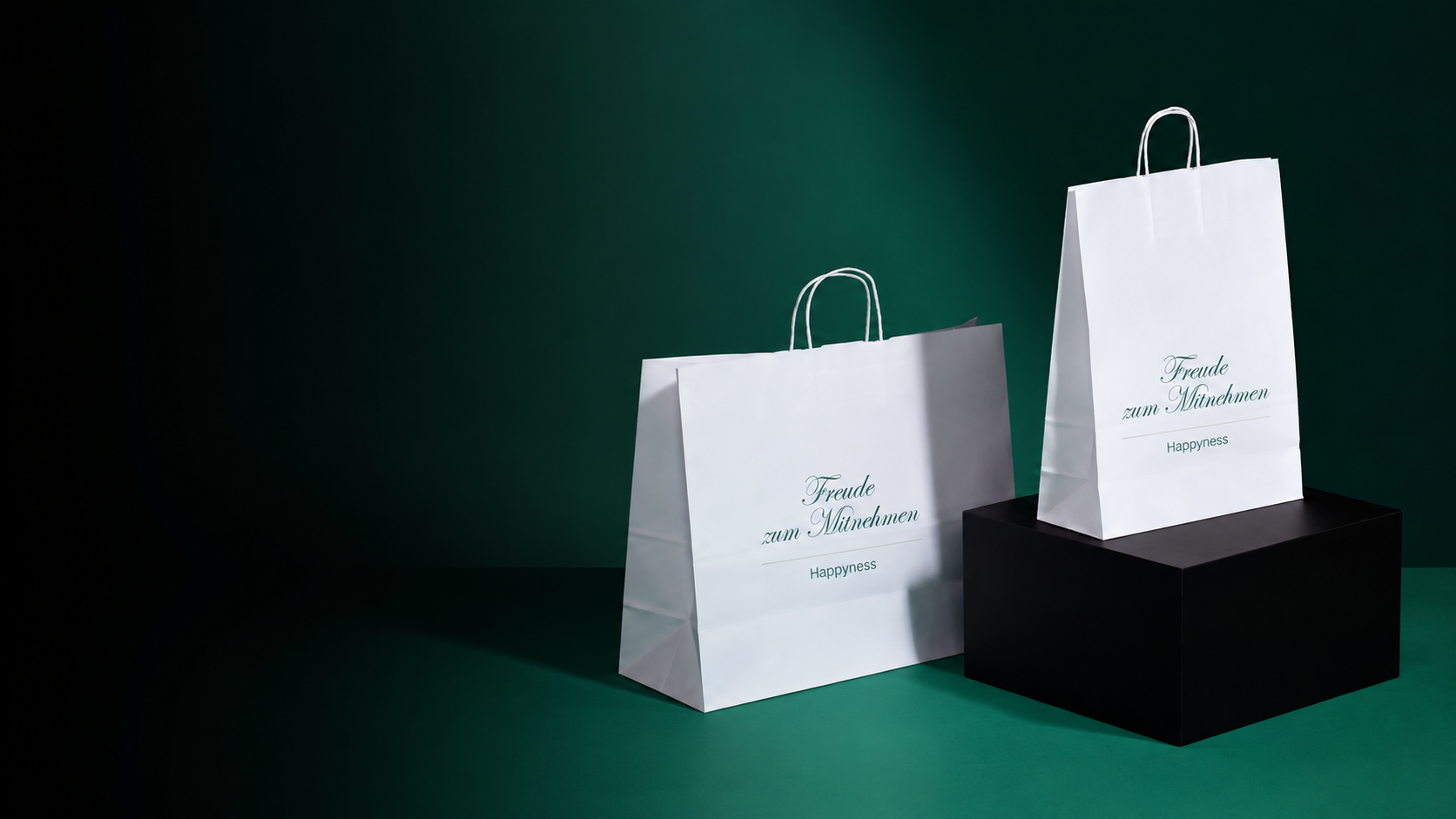 Papiertragetasche und Papiertüte mit Kordel Freude zum Mitnehmen